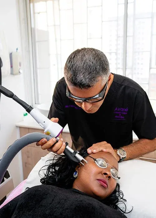 Laser treatment session in a cosmetic clinic.