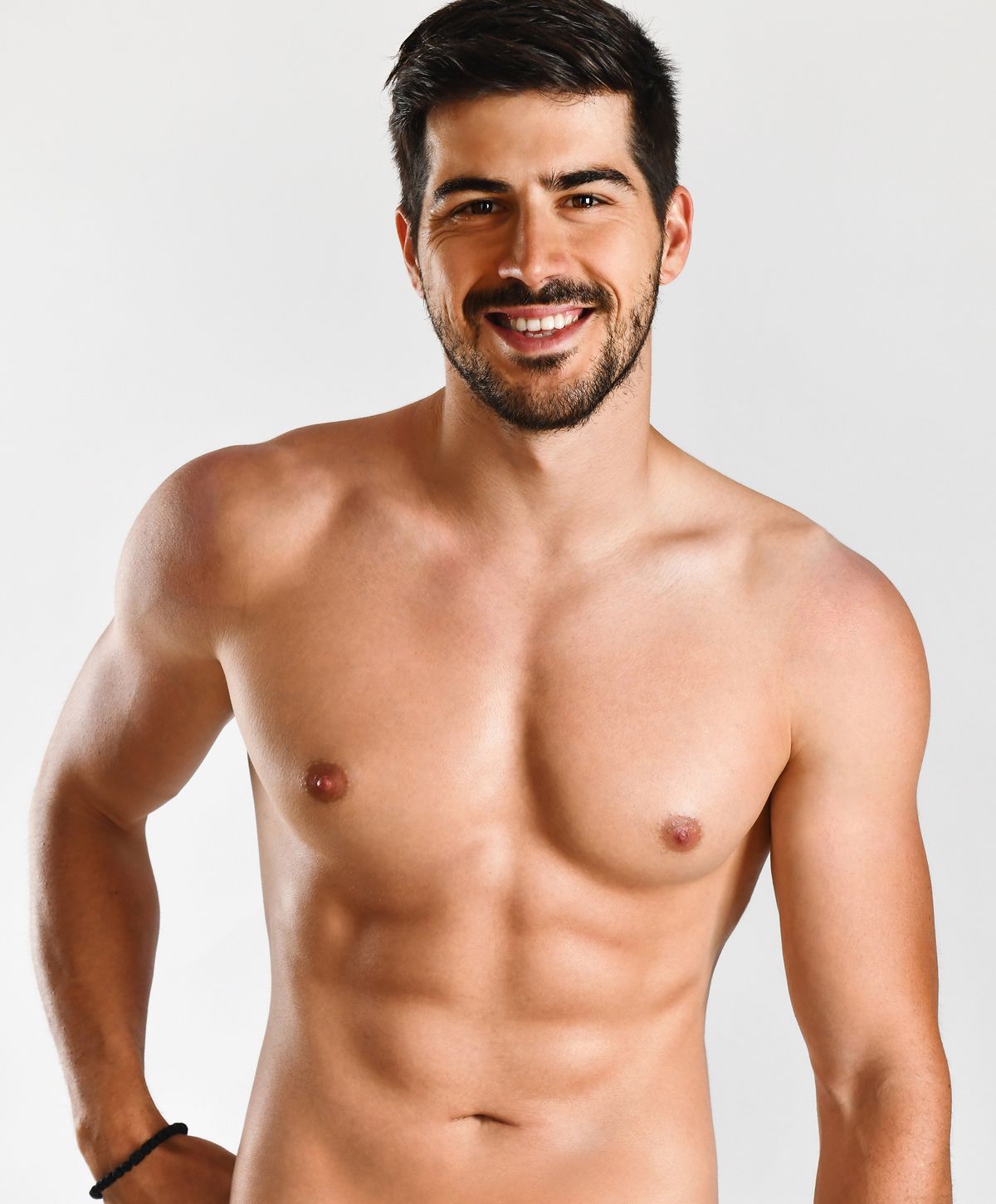 Close-up of a woman relaxing with neutral background.