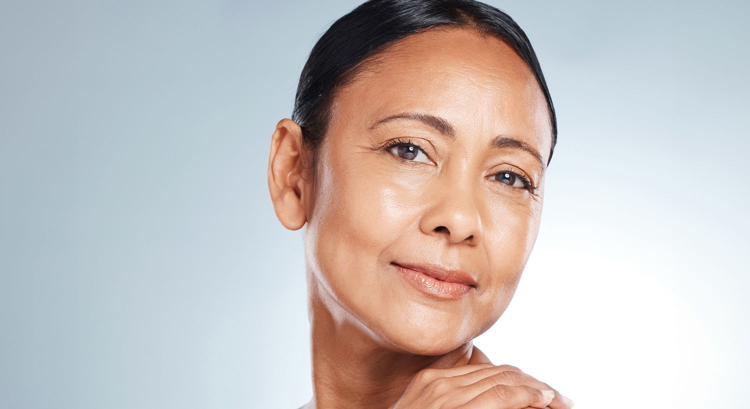 Portrait of a smiling middle-aged woman.