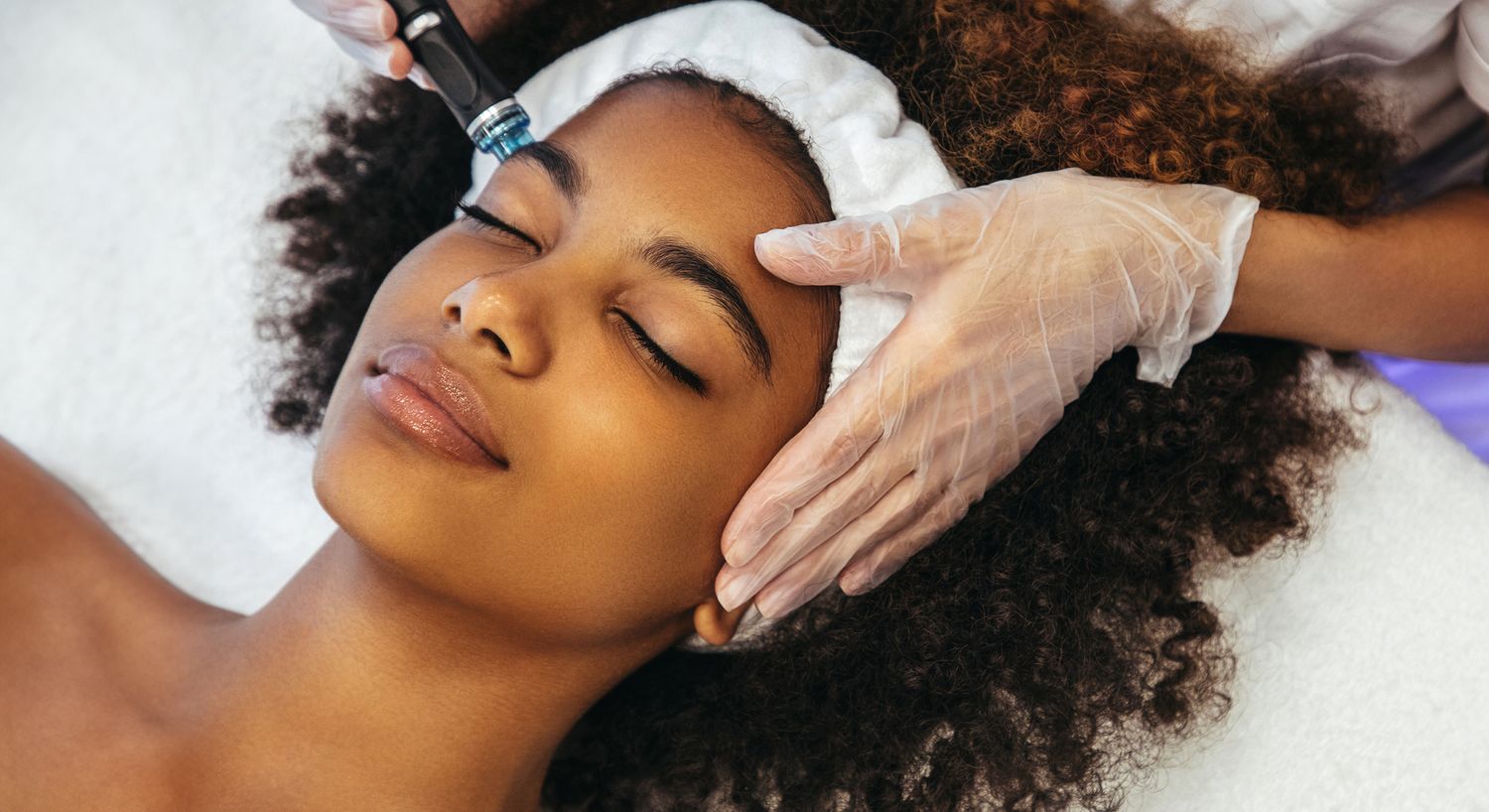 Facial treatment session for skin rejuvenation.